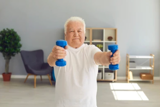 senior person lifting weights