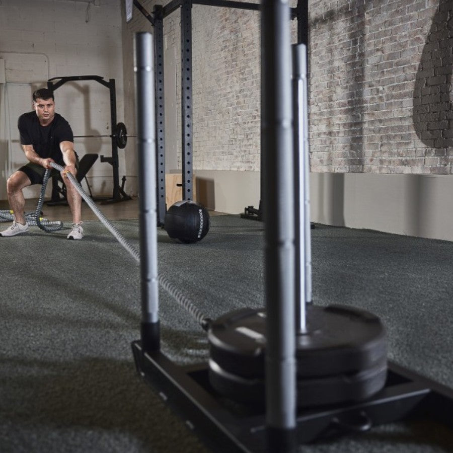 Commercial Hyrox Gym Sled Push And Pull Weight Training Equipment With Wheels For Functional Fitness, Resistance Workouts, And Strength Performance Sessions.