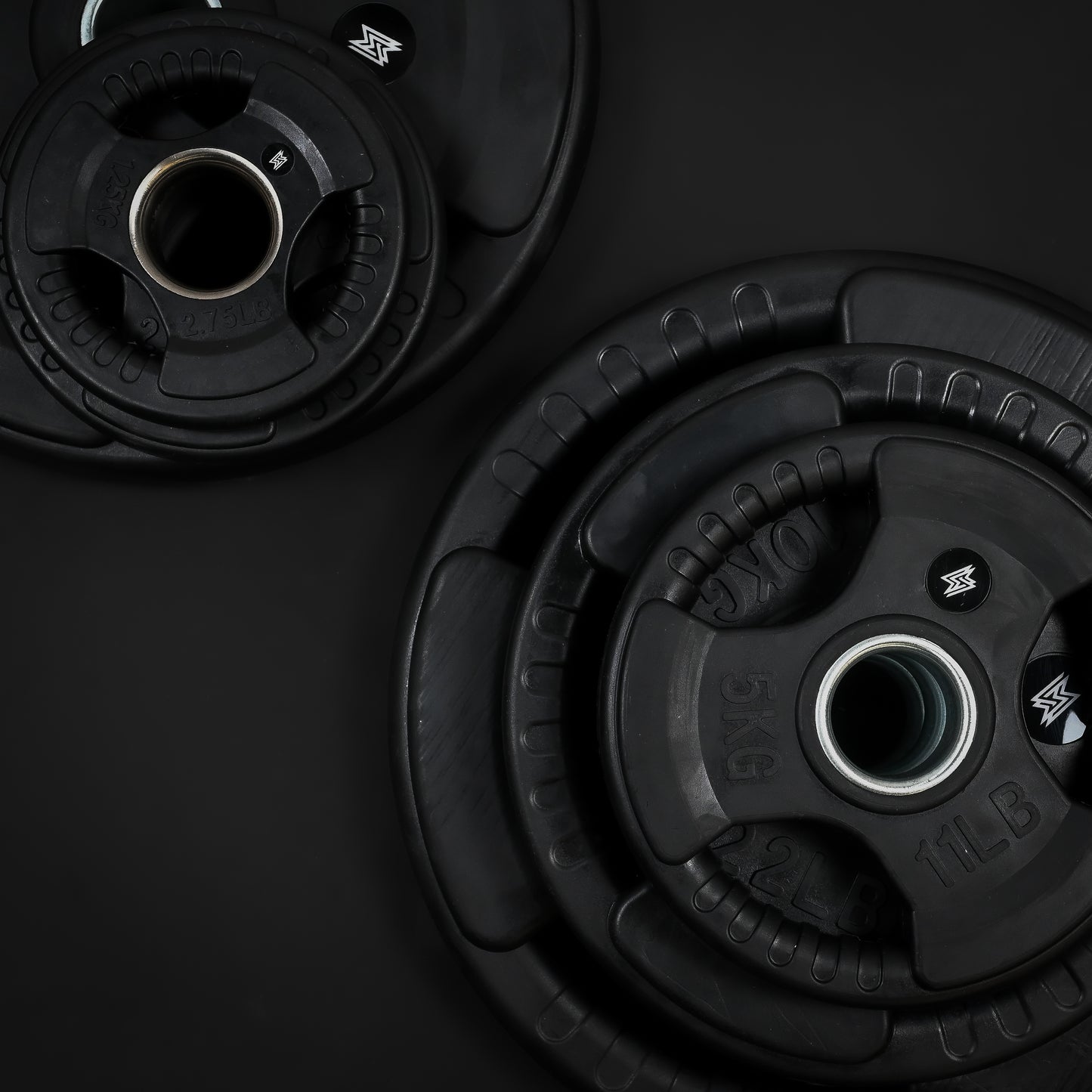Tri-Grip Olympic Weight Plates