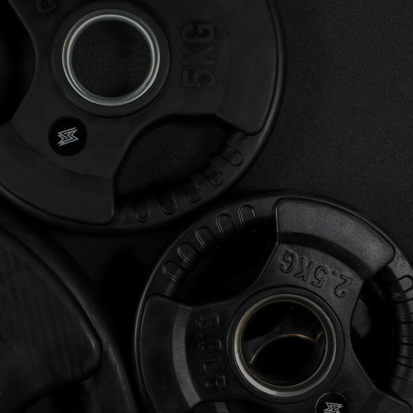 Tri-Grip Olympic Weight Plates