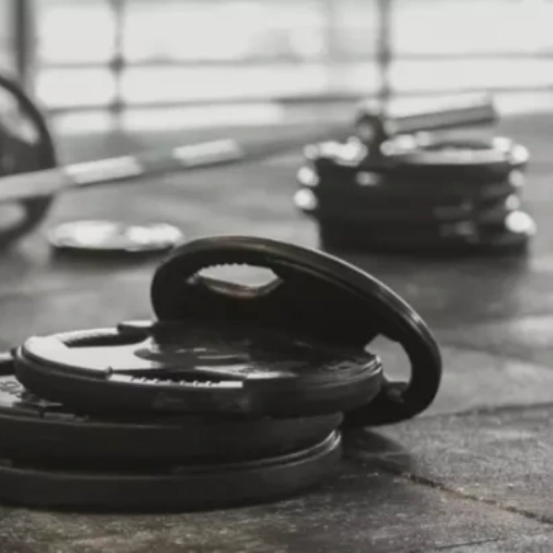 Tri-Grip Olympic Weight Plates